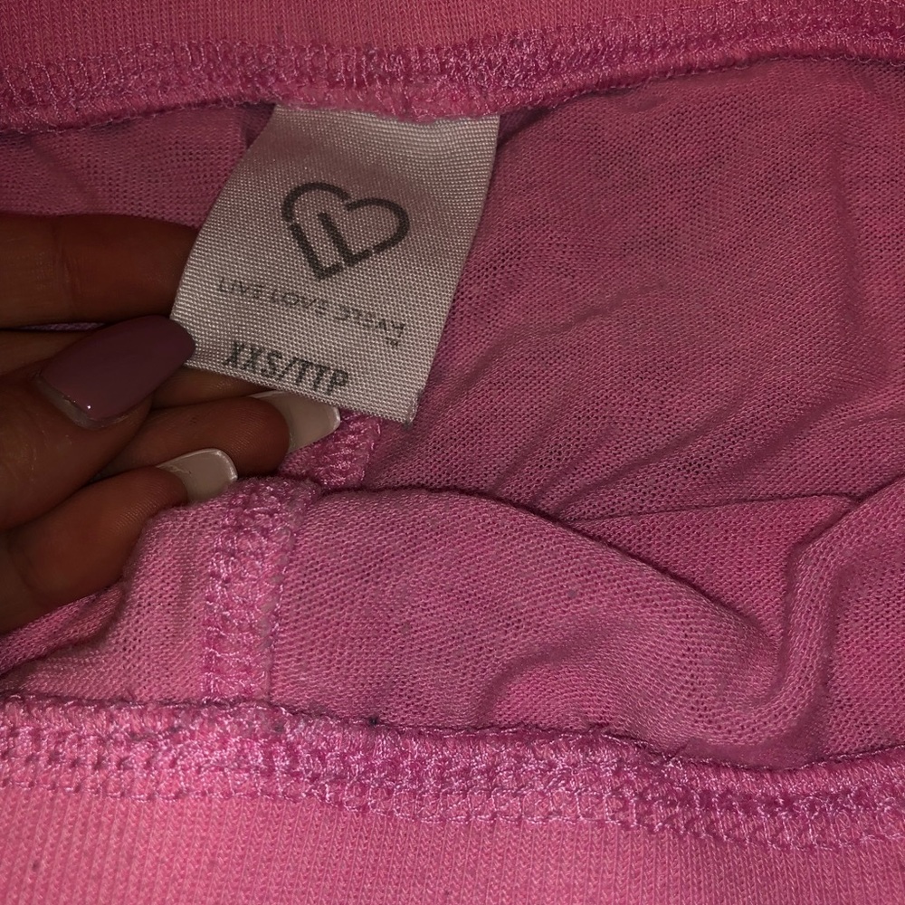 Pink lounging pants.